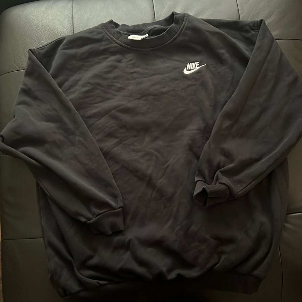 Black Nike crew neck sweater. Size youth XL